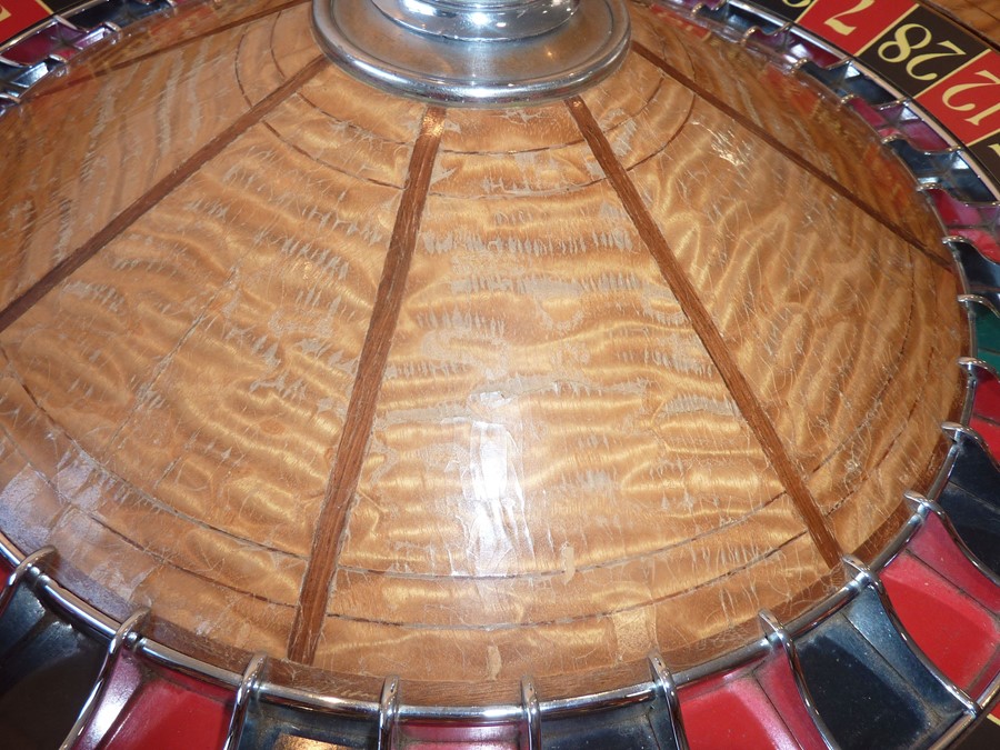 A rare and large late 19th/early 20th century American saloon roulette wheel marked for THE GEO. - Image 6 of 13