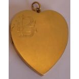 A large 15-carat yellow-gold heart-shaped pendant engraved with initials EB and with hinged side,