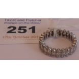 A ladies white metal eternity ring set with hand-cut oval diamonds, ring size N