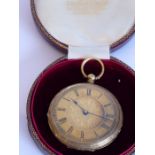 A late 19th century Continental yellow-metal (marked K18) open-faced ladies pocket watch, the