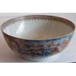 A Chinese porcelain export punch bowl hand-gilded and decorated in famille-rose enamels with figures