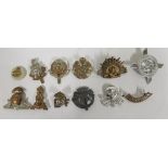 Small quantity of cap badges etc to include a Lancashire Fusiliers, Cornwall, Staybrites etc