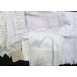 Six cotton and lace table cloths/runners, together with four Levers lace coasters