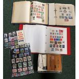 Quantity of world stamps to include three stamp albums together with some loose mounted sheets and