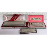 A Larry Adler Professional Chromatic Harmonica by M. Hohner, cased, together with a Echo Harp