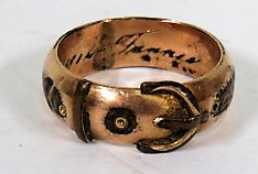 A marked 18ct rose gold belt/buckle ring with an inscription to inner band, ring size M, weight 4.