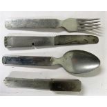 A World War II type field German cutlery set comprising four pieces with German Eagle over