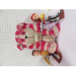 Bagpuss hot water bottle together with two toy story figurines, Woody and Cow Girl Jessie