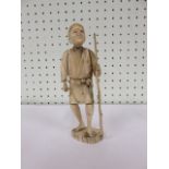 19th century Japanese Okimono sectional figure of a man holding a staff