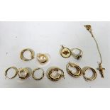 Four matched pairs of mark 9ct gold/375 hoop earrings, gross weight 6.6g, together with a marked 375