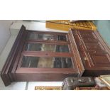 Stained pine sideboard with glazed bookcase top, the base with three drawers above three cupboards