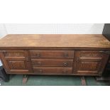 Oak sideboard with three central drawers flanked by two cupboard doors, 82cm x 163cm x 46cm