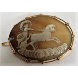 A large 9ct gold oval cameo brooch of Diana the Huntress, measuring approximately 55.3mm x 44mm,