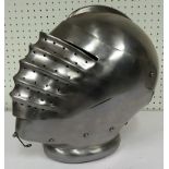 14th century helm, vary heavy with quilted lining and moveable visor Part of a collection of
