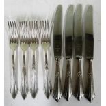 Set of four 'Nirosta' forks and knives