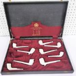 Cased set of eight Dunhill Clay Pipes