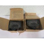 Two World War II respirators in original boxes issued by the County of Wiltshire, one still with