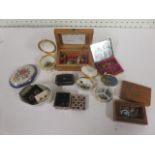 A collection of earrings mostly studs containing in nine trinket boxes to include a Bethlehem