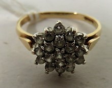 A marked 375 and import marks gold white stone cluster ring, ring size O 1/2, weight 2g