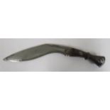 A military Kukri believed to be World War II, blade approximately 12 inches secured by two steel