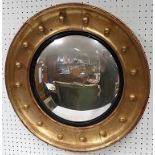 Circular gilt wall mirror