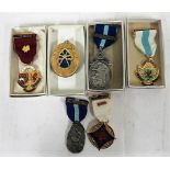 Collection of Masonic medals contained in four boxes to include Royal Masonic Institution for the