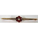 A Victorian marked 15ct gold bar brooch decorated with seed pearls and pink ?paste stones, weight to