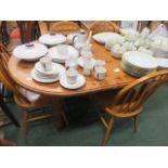 Pine extending dining table with four chairs
