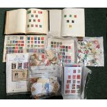 Three albums of world stamps, together with some loose stamps and sheets
