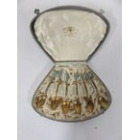 Set of six gilt and blue enamel tea spoons, cased