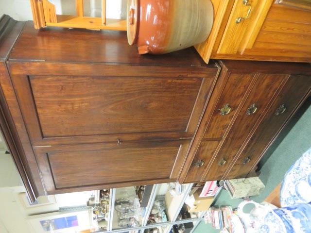 19th mahogany linen press, the base with two short drawers above two long drawers, the top with