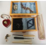 A collection of vintage costume jewellery to include a wicker box, two button hooks in ebony and