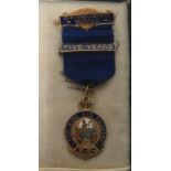 A privately produced medal for distinguished service, with blue ribbon and with bar for five