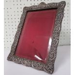 Victorian embossed silver photograph frame, measuring 27cm x 20cm, hallmarked for Birmingham 1922