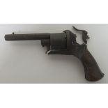 A small pin fire revolver 6 shot. Condition: Some minor rust and pitting, the trigger broken off but