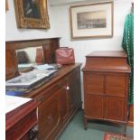 An Arts and Crafts sideboard with partly mirrored back with two doors and two drawers below 143 x