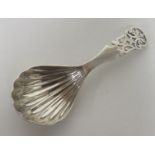 Silver caddy spoon, the handle with lattice design and the bowl with shell design, hallmarked for
