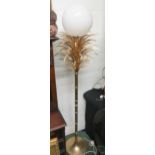 One 'pineapple' brass standard lamp with white opaque round globe glass.