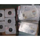 An accumulation in two boxes of 3.5kgs mint stamps, together with used world in five containers,