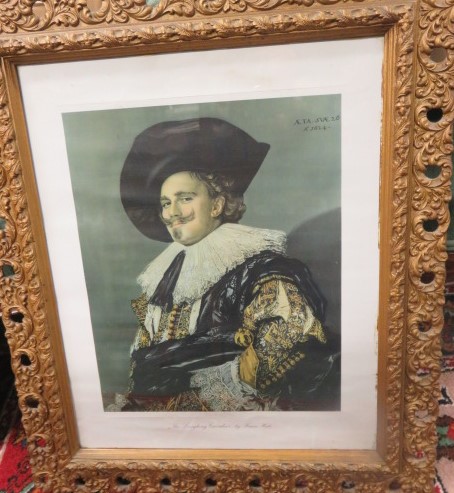 After Frans Hals - a print titled The Laughing Cavilier in gilt frame, 49cm x 39cm