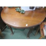 An oval reproduction Mahogany dining table 118 x 104 x 69 plus extra leaf