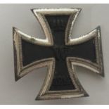 A World War II First Class iron cross with pin back Condition: Some service wear Provenance: Part of