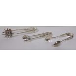 Two pairs of hallmarked silver sugar tongs, gross weight 1.5ozt, together with a pair of silver