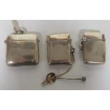 Three plain silver vesta cases, each hallmarked for Birmingham, together with a silver salt spoon,