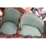 A dark green Edwardian style oval backed settee and single chair