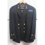 A Royal Navy Petty Officers Tunic, with Queens Crown Buttons and collar badges for a Weapons