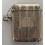 George V silver vesta case with engine turned design and fancy ribbed detail, hallmarked for