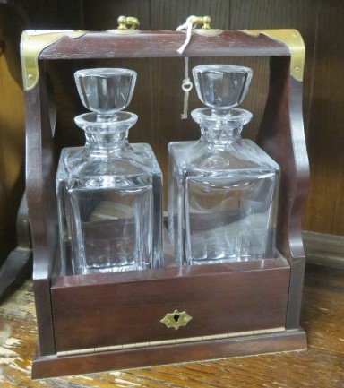 An oak and brass two bottled tantalus