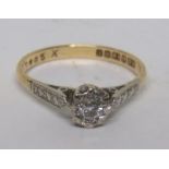 An 18ct gold diamond solitaire ring, hallmarked for Birmingham, and with markers mark HS, the