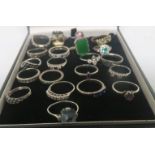 A collection of twenty-one white metal dress rings, to include a marked 9ct white gold diamond